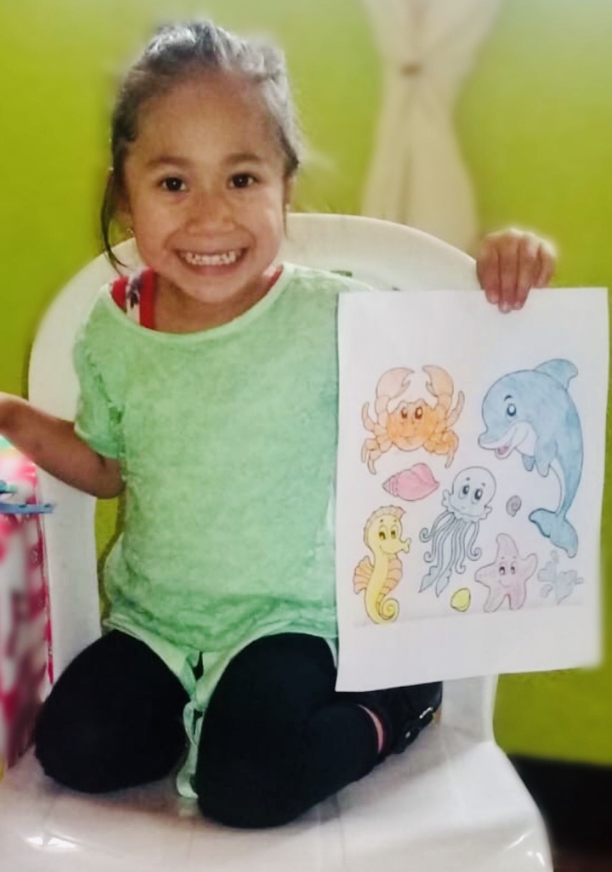 GoodNews5 Maya student shares her completed school work with her teacher via photo